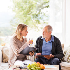 nurse talking to elder