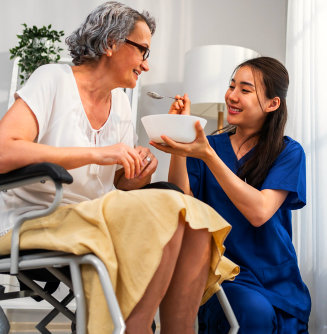 nurse feeding elder