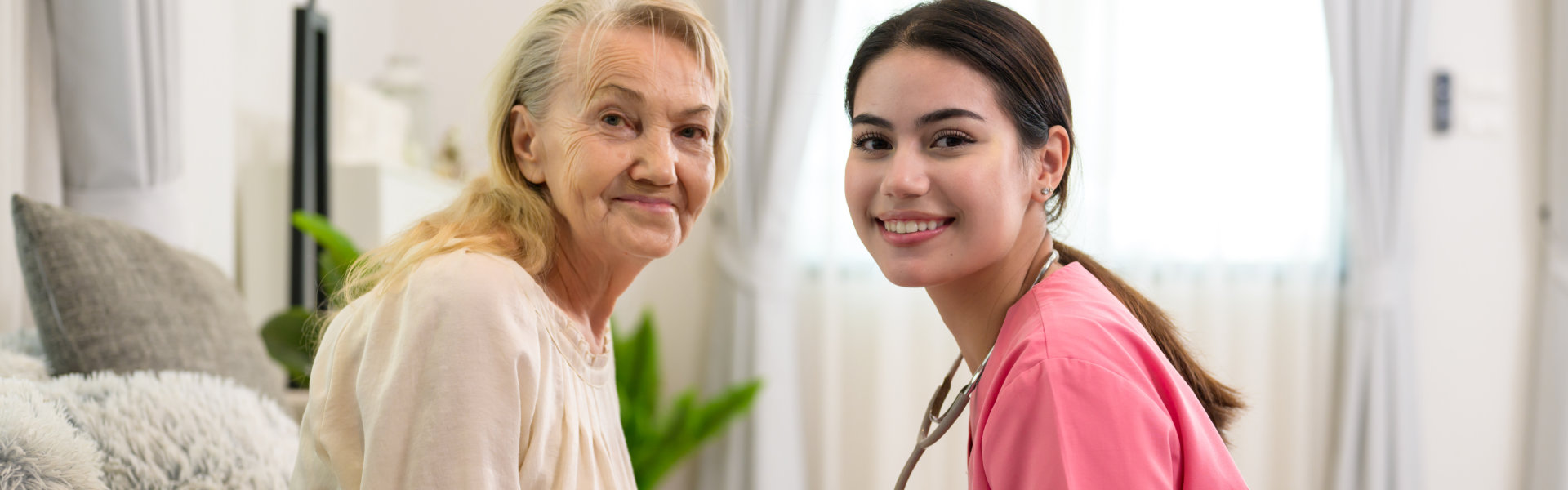 nurse and elder smiling